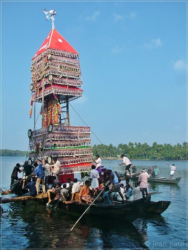 Thrikadavoor Temple festival on lake